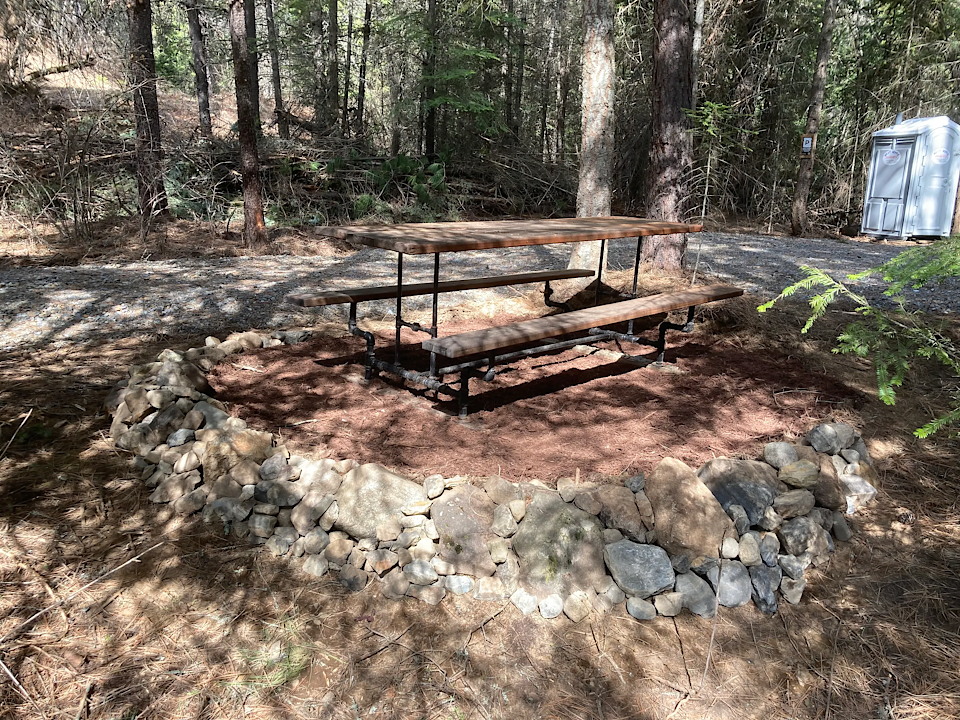 Picnic table and porta potty